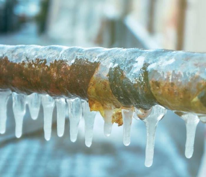 Picture of a frozen pipe that has been exposed to the cold